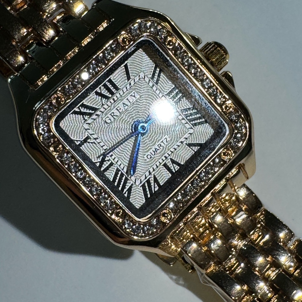 Gold and Silver Watch with Blue Accents